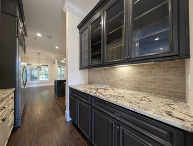 Welcome to 400 Chamberlin Road! This custom waterway home offers - photo 21