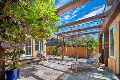 Ocean and golf course views take center stage in this - photo 32
