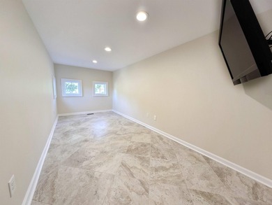 Welcome to 400 Chamberlin Road! This custom waterway home offers - photo 37