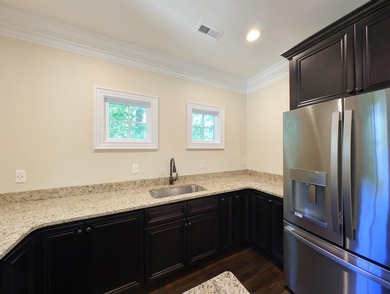 Welcome to 400 Chamberlin Road! This custom waterway home offers - photo 40