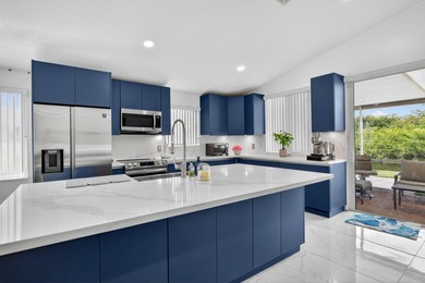 Step into this exquisitely updated 3-bedroom, 2-bathroom with a - photo 3