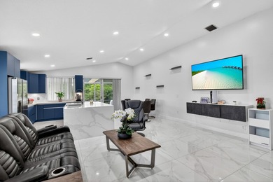 Step into this exquisitely updated 3-bedroom, 2-bathroom with a - photo 7