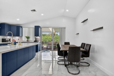 Step into this exquisitely updated 3-bedroom, 2-bathroom with a - photo 8