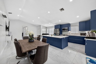 Step into this exquisitely updated 3-bedroom, 2-bathroom with a - photo 9