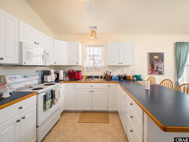 213 E Aycock St offers a well kept coastal retreat in the - photo 10