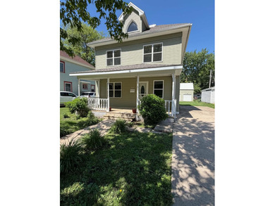 Charming and move~in ready, this 2~story home features 3 - photo 2