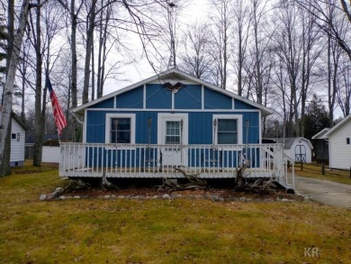 Wixom Lake Home Sale Pending in Beaverton Michigan