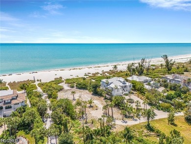 Nestled along the majestic shoreline on Sanibel, this beautiful - photo 11