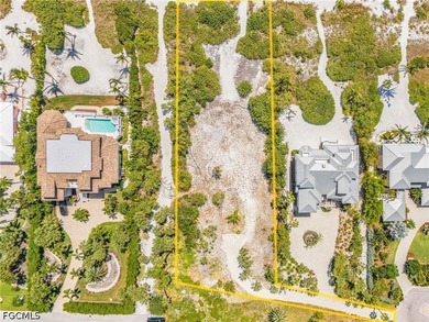 Nestled along the majestic shoreline on Sanibel, this beautiful - photo 13