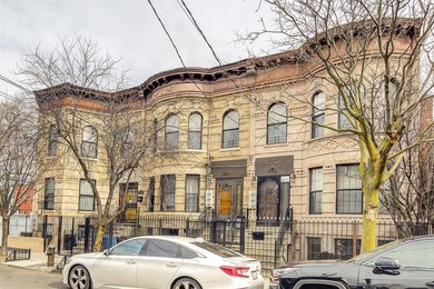 This stunning and meticulously maintained all-brick two-family - photo 1