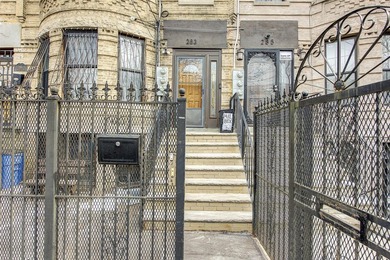 This stunning and meticulously maintained all-brick two-family - photo 2