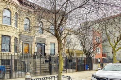 This stunning and meticulously maintained all-brick two-family - photo 3