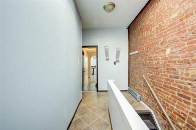 This stunning and meticulously maintained all-brick two-family - photo 5