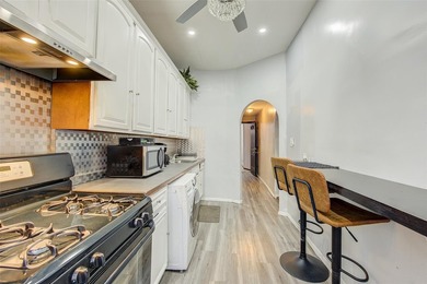 This stunning and meticulously maintained all-brick two-family - photo 7