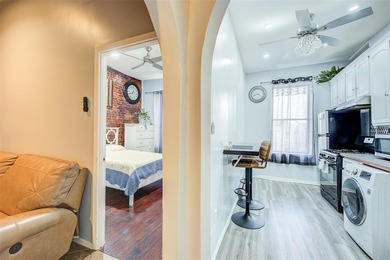 This stunning and meticulously maintained all-brick two-family - photo 9