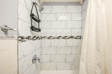 This stunning and meticulously maintained all-brick two-family - photo 10