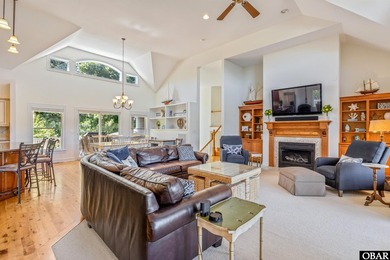Tucked inside the gates of The Currituck Club, this six-bedroom - photo 5