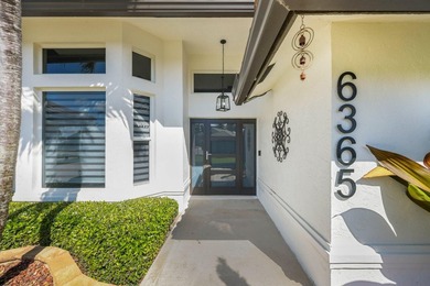 Modern luxury home in the gated community of Lacuna featuring - photo 9