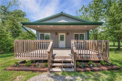 **COMING SOON** This beautifully remodeled lake house in the