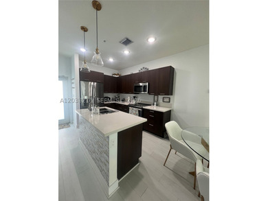 Elegant 3-bed, 2-bath condo in the heart of Doral, offering - photo 3