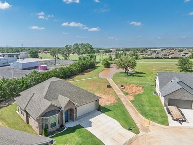 **NEW HOME WITH POND VIEWS & EASY COMMUTE TO OKC!** Located in a - photo 3