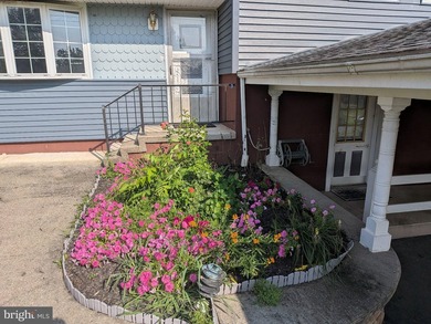 This charming split-level home, built in 1960, offers a perfect - photo 14