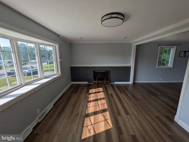 This charming split-level home, built in 1960, offers a perfect - photo 15