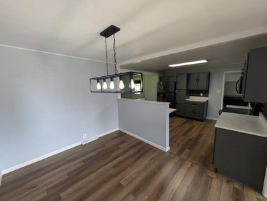 This charming split-level home, built in 1960, offers a perfect - photo 17