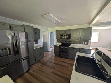 This charming split-level home, built in 1960, offers a perfect - photo 19