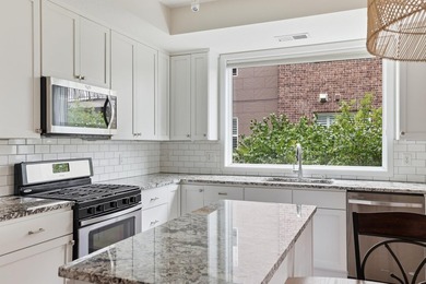 Experience sophisticated, low-maintenance living at **Wooddale - photo 23