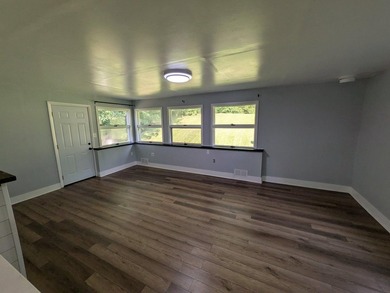 This charming split-level home, built in 1960, offers a perfect - photo 23