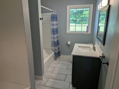 This charming split-level home, built in 1960, offers a perfect - photo 26