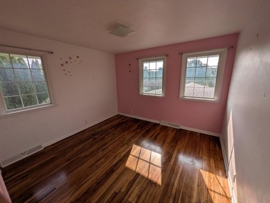 This charming split-level home, built in 1960, offers a perfect - photo 31
