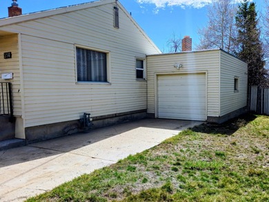 Take a look at this inviting 4-bedroom, 2-bathroom home tucked - photo 2