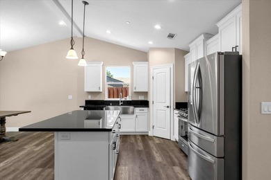 Built in 2021, this beautifully appointed home offers the - photo 13