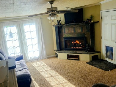 Take a look at this inviting 4-bedroom, 2-bathroom home tucked - photo 8