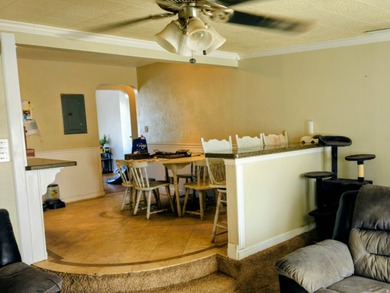 Take a look at this inviting 4-bedroom, 2-bathroom home tucked - photo 9