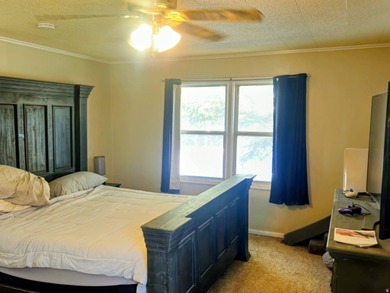 Take a look at this inviting 4-bedroom, 2-bathroom home tucked - photo 10