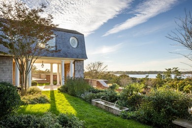 Nestled between the Atlantic Ocean and Georgica Pond lies a - photo 6
