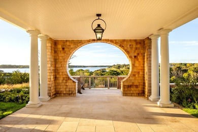 Nestled between the Atlantic Ocean and Georgica Pond lies a - photo 8