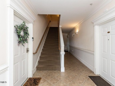 Discover this delightful first-floor condo in a secured building