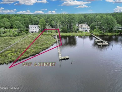 Waterfront homesite with extensive dock frontage in the gated - photo 2