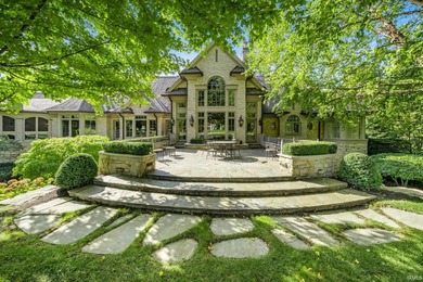 Situated on a picturesque 2-acre waterfront lot, this Rans