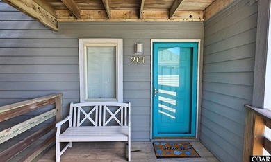 Unit 201 at Gulfstream Condominiums feels like stepping into the - photo 2