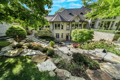 Situated on a picturesque 2-acre waterfront lot, this Rans