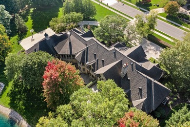 Situated on a picturesque 2-acre waterfront lot, this Rans