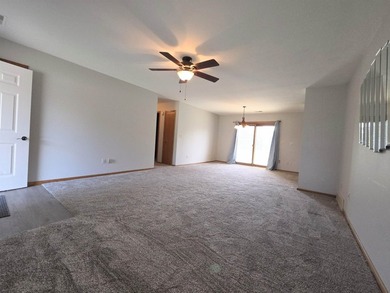 Accessible, zero-entry, open-concept townhouse situated on a - photo 3