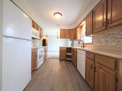Accessible, zero-entry, open-concept townhouse situated on a - photo 8