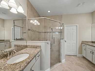 Set on a unique lot with stunning lakefront and preserve views - photo 12