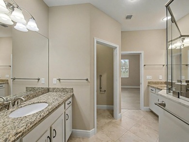 Set on a unique lot with stunning lakefront and preserve views - photo 13